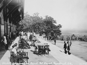 People at refreshment tables in front of the chalet at the Mount Royal lookout in Montreal, 1932-1933.