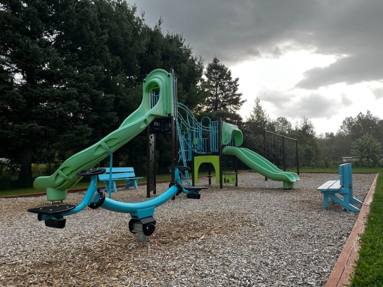 A playground with a slide. 