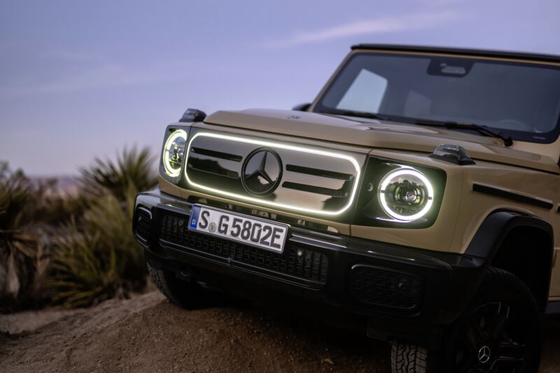 A beige Mercedes G-Wagon off roads