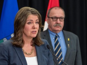 Premier Danielle Smith and Municipal Affairs Minister Ric McIver