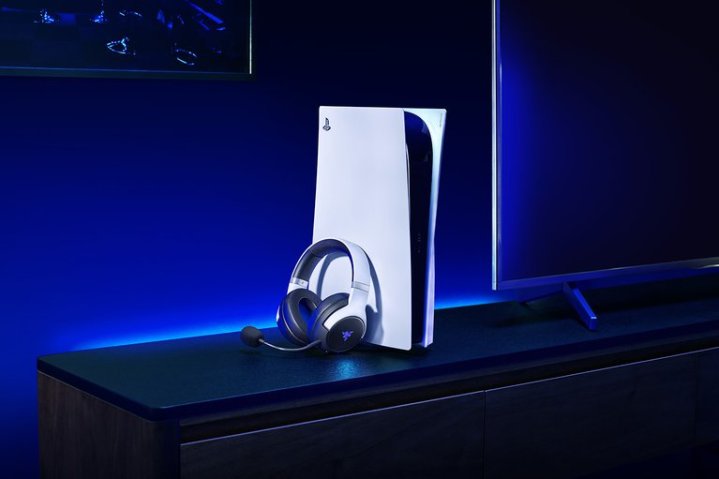 The Razer Kaira Pro sitting next to a PS5 console.