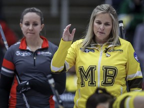 Team Manitoba-Jones skip Jennifer Jones, right, gestures to her teammates as Team Ontario--Homan skip Rachel Homan looks on at the Scotties Tournament of Hearts in Calgary, Saturday, Feb. 24, 2024. Jones will soon call time on one of the best careers in curling history. Rachel Homan is set to put a bow on one of the best seasons ever played. Two of Canada's best skips will be in the spotlight this week as the Grand Slam of Curling circuit concludes with the Princess Auto Players' Championship at the Mattamy Athletic Centre in Toronto.