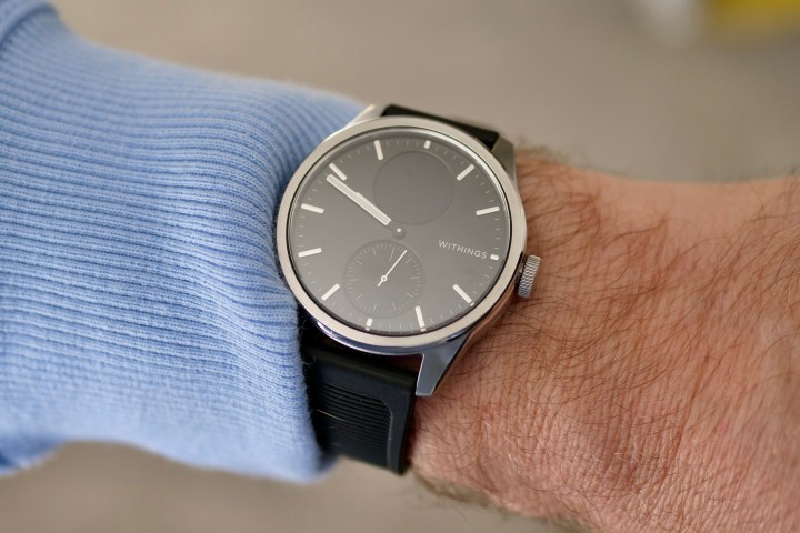 A person wearing the Withings ScanWatch 2.