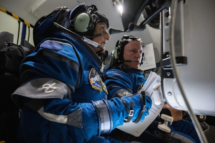 NASA’s Boeing Crew Flight Test Astronauts Butch Wilmore and Suni Williams prepare for their mission in the company’s Starliner spacecraft simulator at the agency’s Johnson Space Center in Houston.