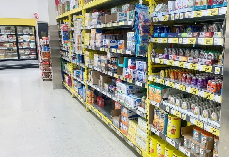 Products on shelves in a grocery store.  