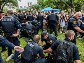 Students are arrested during a pro-Palestine demonstration at the The University of Texas at Austin on April 24, 2024 in Austin, Texas. Students walked out of class and gathered in protest during a pro-Palestine demonstration. Protests continue to sweep college campuses around the country.