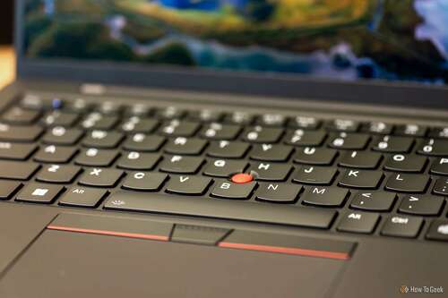 The keyboard, trackpad, and TrackPoint of the Lenovo X1 Carbon Gen 12.