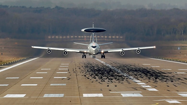 A NATO airborne warning and control systems aircraft takes off from a base near the German-Dutch border. NATO has now begun reconnaissance flights with AWACS over Poland and Romania to monitor the situation in neighbouring Ukraine.