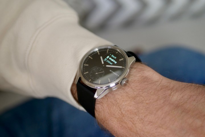 A person wearing the Withings ScanWatch 2.