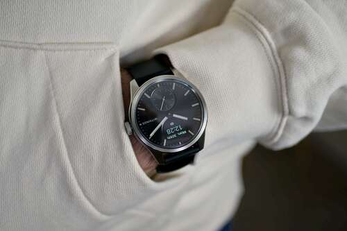 A person wearing the Withings ScanWatch 2.