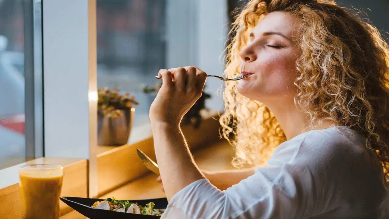 woman-enjoying-meal