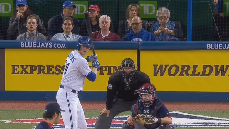 A baseball game and shot of home plate