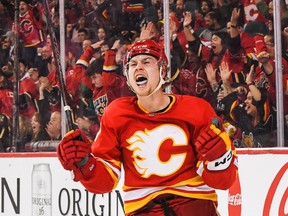 Connor Zary of the Calgary Flames celebrates after scoring against the Tampa Bay Lightning.