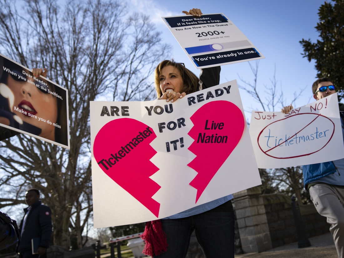 Penny Harrison and her son Parker Harrison rally against the live entertainment ticket industry outside the U.S. Capitol last year.