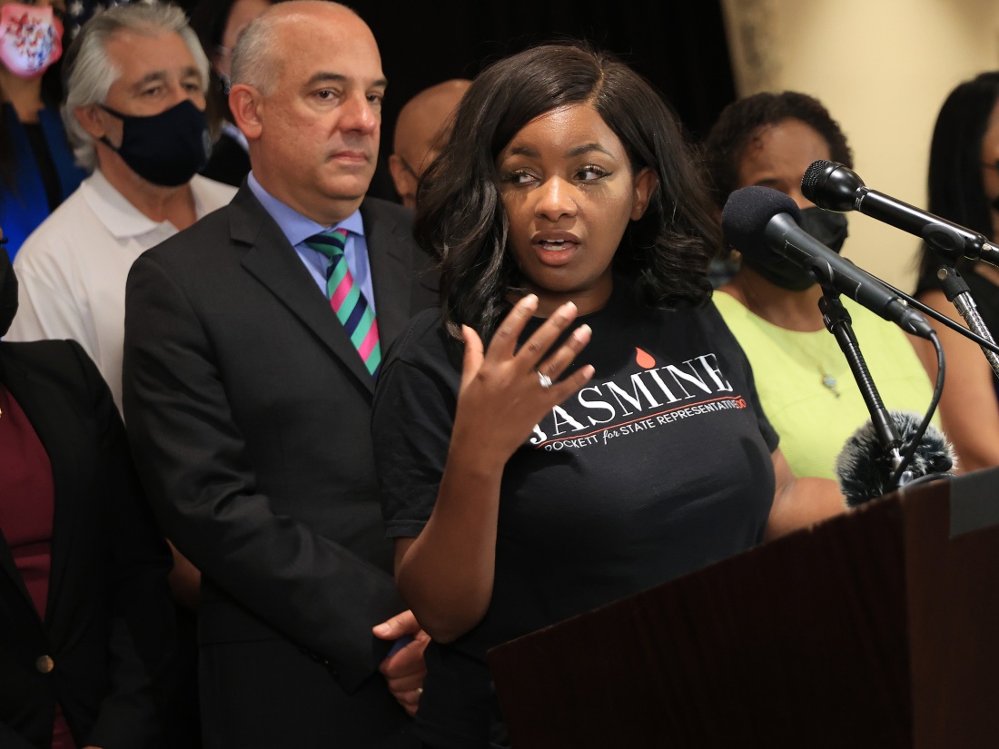 Then-Texas state Rep. Jasmine Crockett is joined by Democratic lawmakers during a news conference on July 23, 2021, in Washington, D.C. 