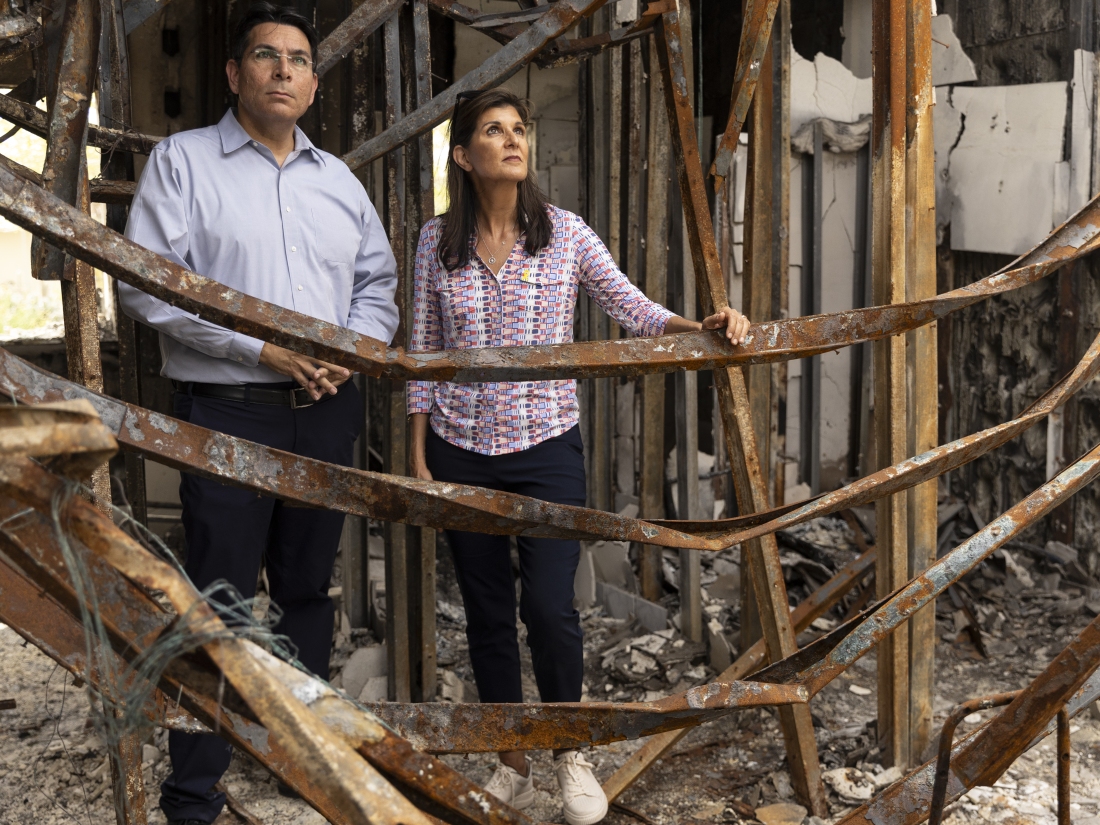 American politician Nikki Haley (R) and Parliament member Danny Danon (L) visit a kibbutz Monday that was damaged during the Oct. 7 Hamas attack in Nir Oz, Israel.