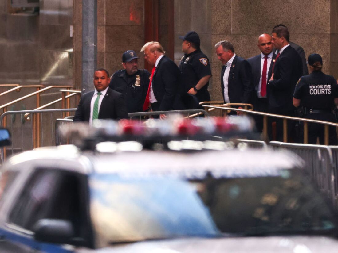 Former President Donald Trump leaves Manhattan Criminal Court at the end of the day's proceedings during his criminal trial for allegedly covering up hush money payments in New York City on Tuesday.