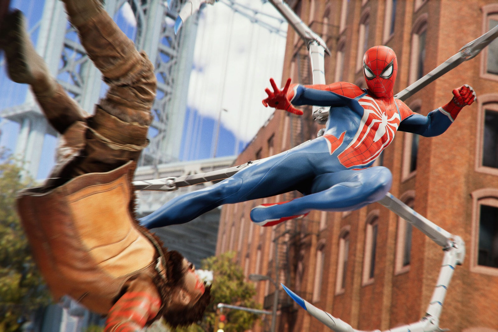 Screenshot from the game Marvel's SpiderMan 2 featuring SpiderMan fighting a villain