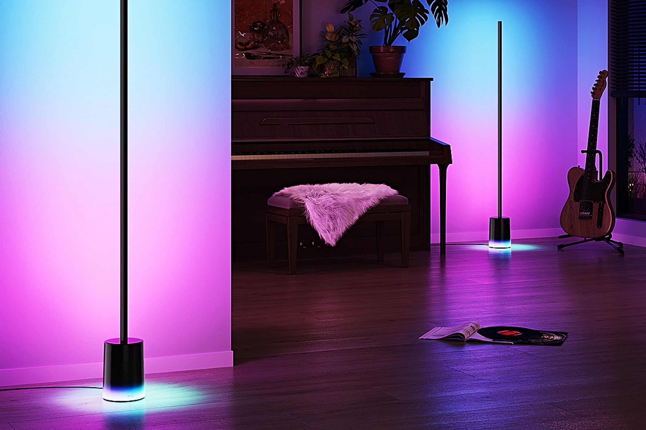 Two Govee Floor lamp 2s illuminating a music room in a purple hue.