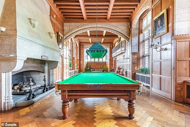 The stately rooms include a dining room, drawing room, billiard room and a well-stocked library with its four stained glass windows
