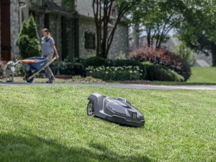 Husqvarna 18-volt Automower 430X robot mower cutting grass on its own.