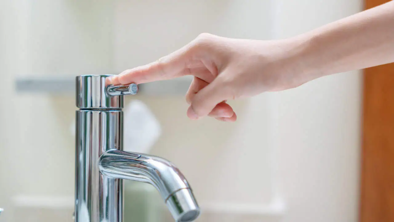 turning off the running water in the bathroom