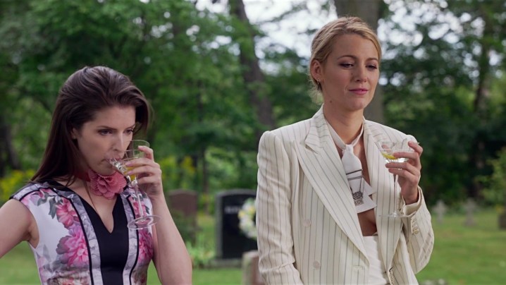 Two women drink in A Simple Favor.