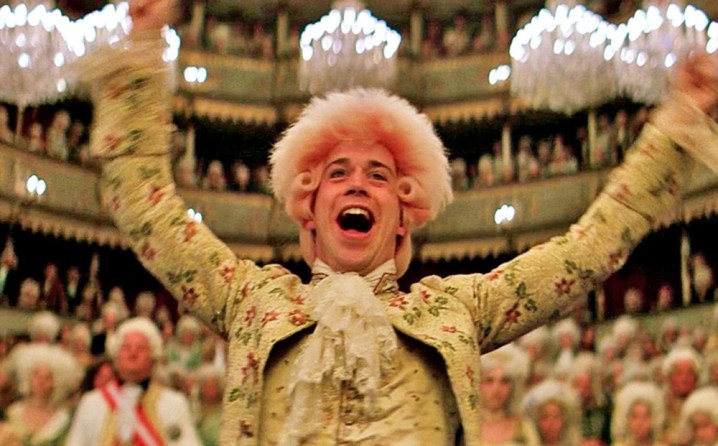 Mozart conducts an orchestra in Amadeus.