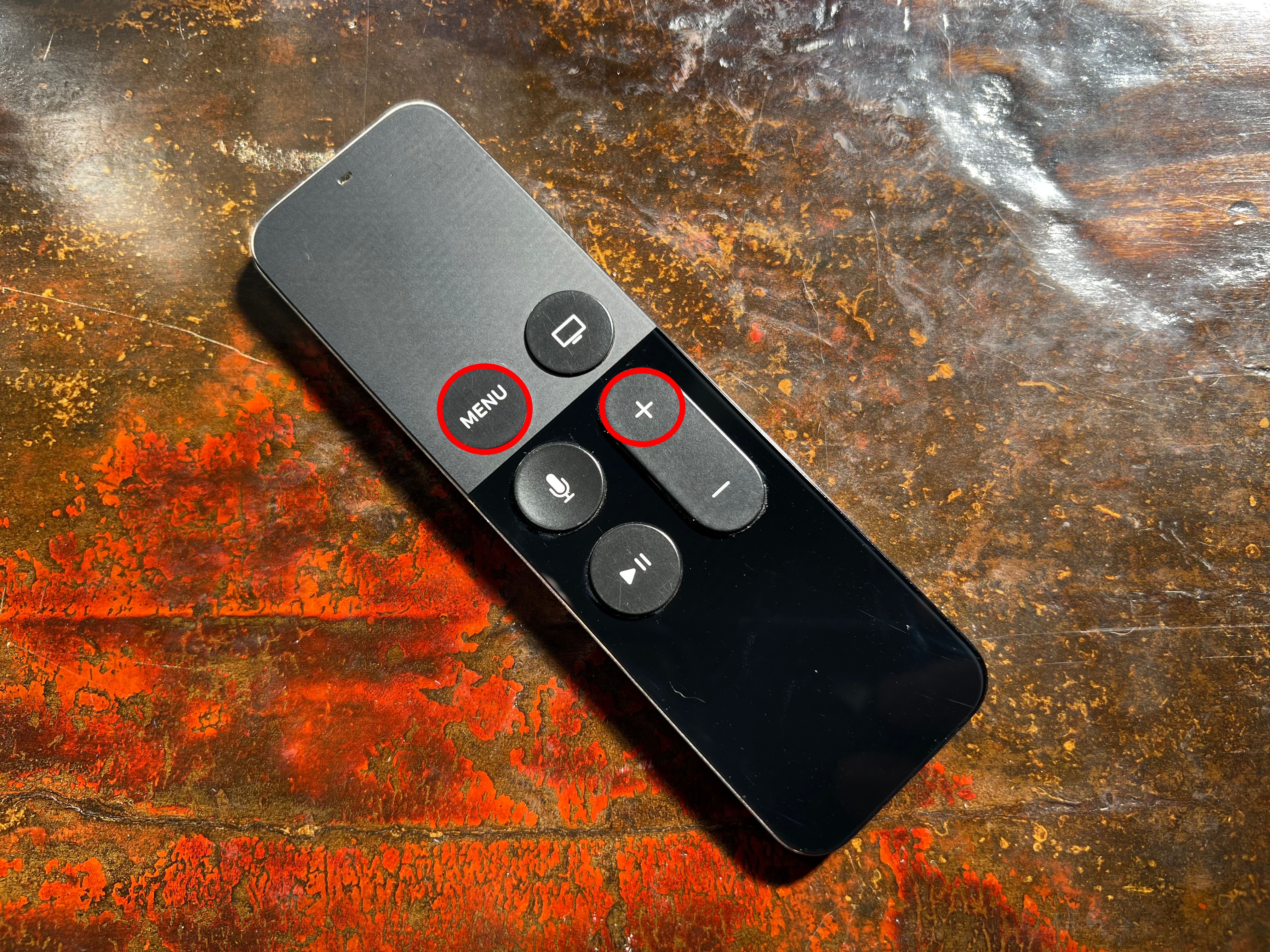 Apple TV remote pairing button combination.