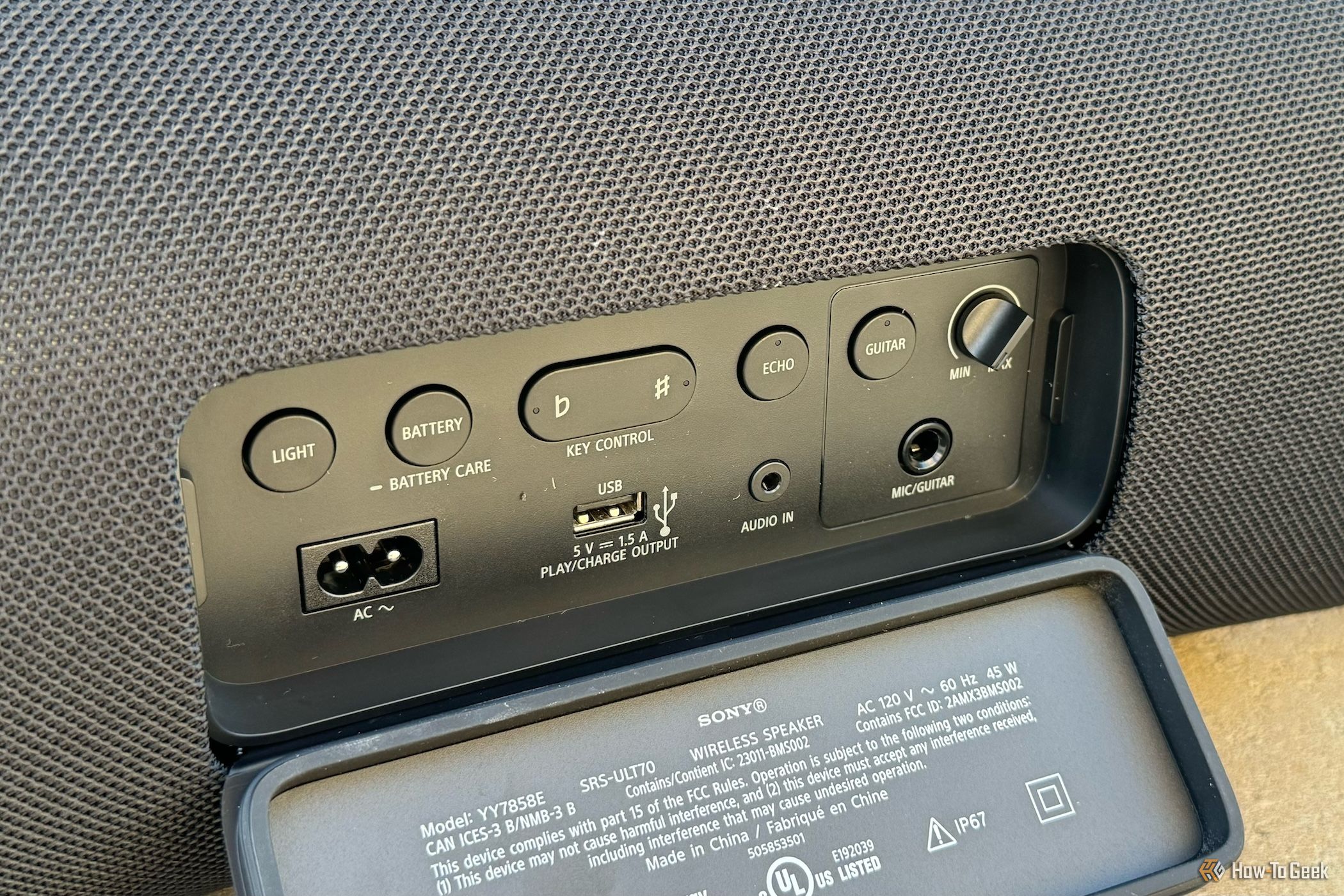 back flap of the Sony ULT Field 7 open showing ports