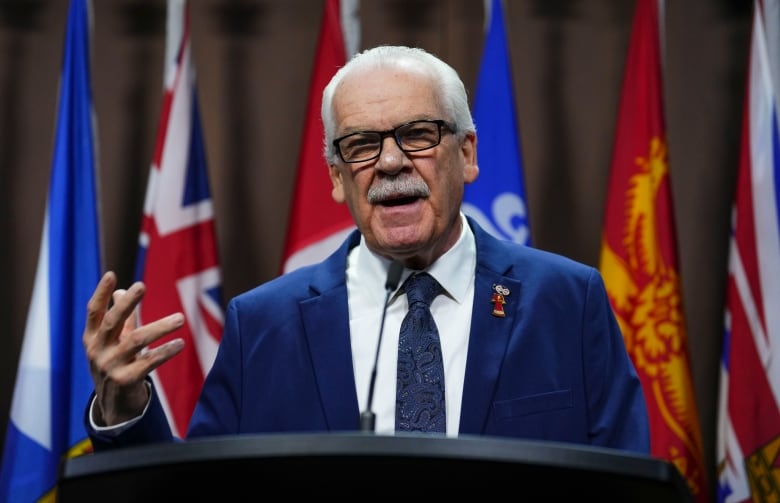 A union leader speaks at a news conference.