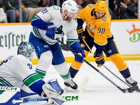 ian cole canucks passes puck stanley cup playoffs