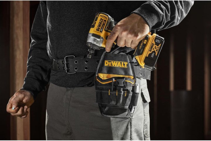 A man wearing the DeWalt Impact Holster.