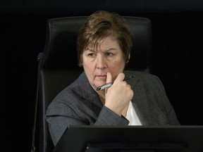 A public inquiry has found foreign meddling attempts didn't change who won the last two elections, but it may have changed the result in one riding in 2021. Commissioner Justice Marie-Josee Hogue listens to a lawyer speak during the Public Inquiry Into Foreign Interference in Federal Electoral Processes and Democratic Institutions, in Ottawa, Thursday, March 28, 2024.