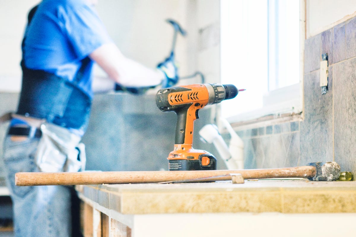 Man working with a power drill 