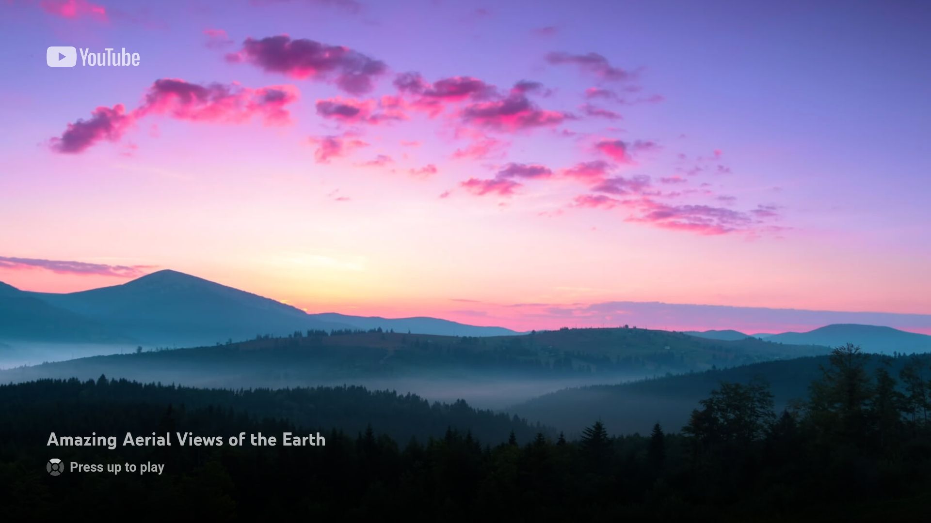 YouTube's screensaver on Apple TV showing aerial views of Earth.