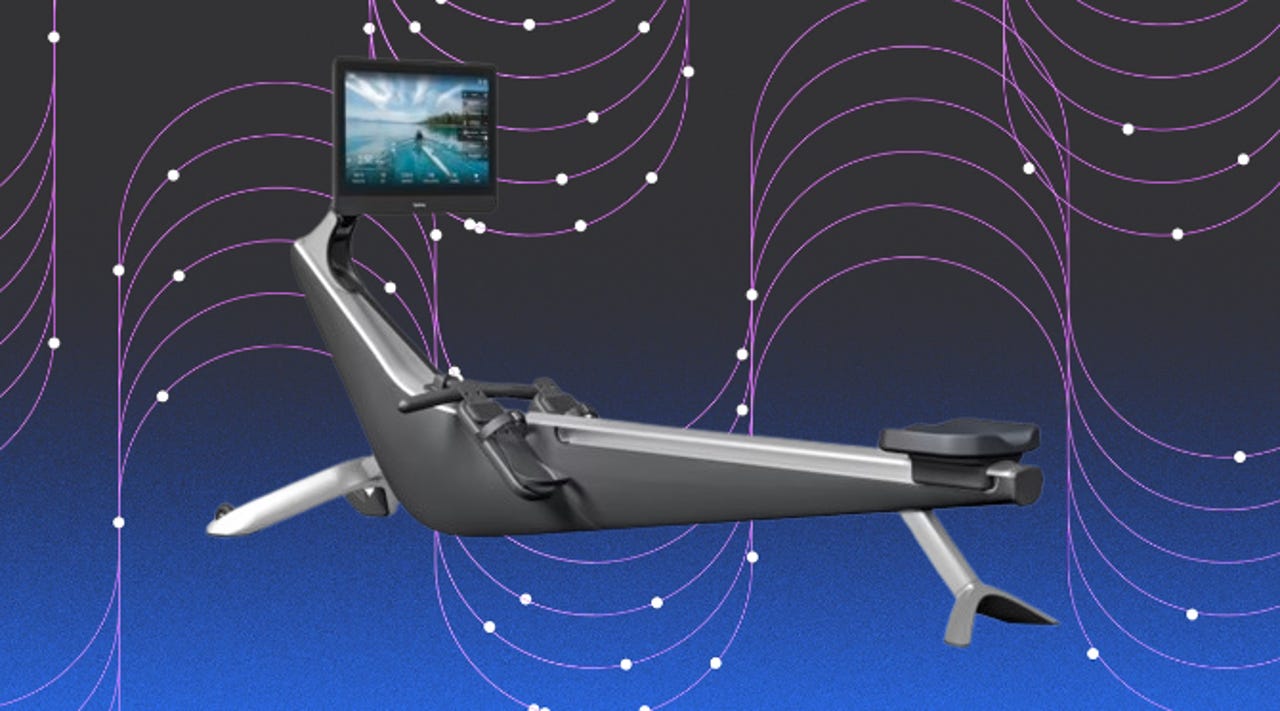 A Hyrdrow Rower machine against a patterned purple and black background