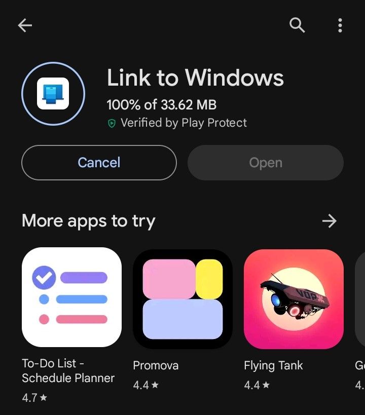 The Link to Windows app is being downloaded from Google Play Store