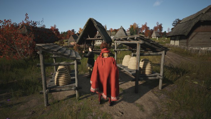 Running around a Manor Lords village in third-person.