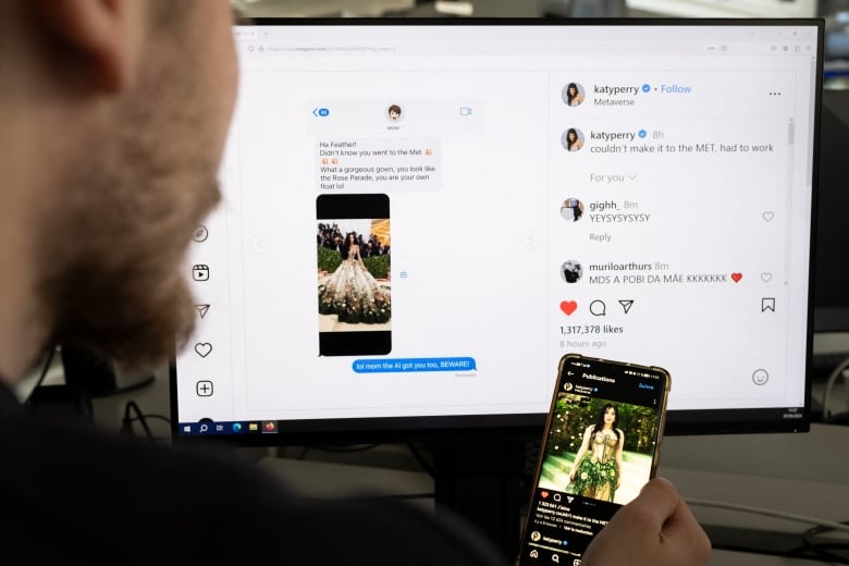 A person holds a phone showing an image  of a woman in a dress, with a computer screen in the background showing the same 