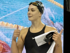 Penny Oleksiak celebrates after winning the women's 50m freestyle at the Canadian Olympic Swim Trials in Toronto on Sunday May 19, 2024.