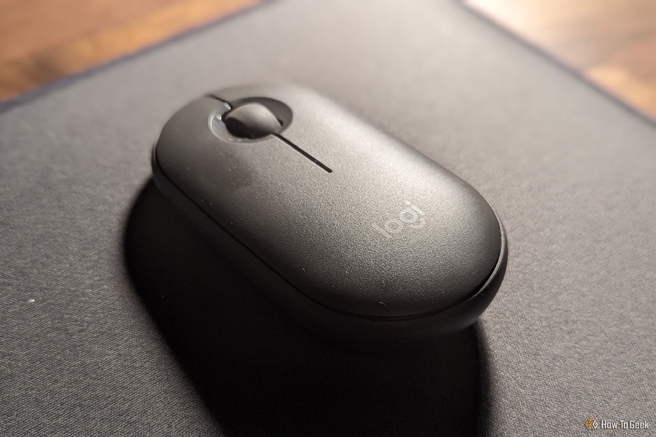 Logitech Pebble Bluetooth mouse on a mouse pad