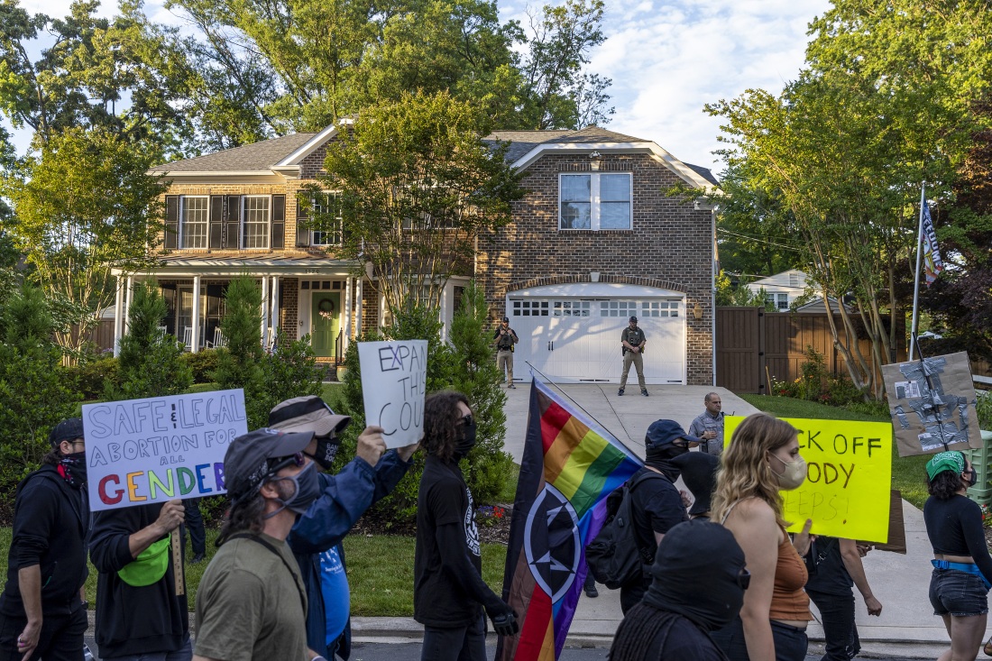 Abortion rights protesters demonstrate outside Supreme Court Justice Alito's home in Northern Virginia on June 27, 2022.