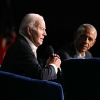 President Biden speaks next to former President Barack Obama onstage during a campaign fundraiser in Los Angeles on June 15,