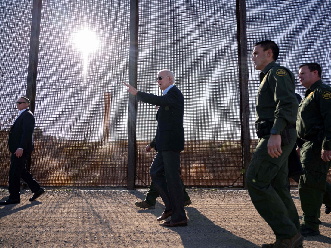 US President Joe Biden walks along the US-Mexico border fence in El Paso, Texas, on January 8, 2023.