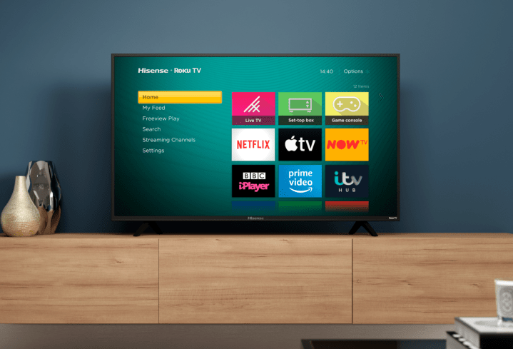 Hisense 4K TV on a cabinet.