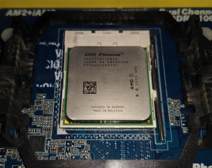 The Intel Phenom X3 socketed in a motherboard.