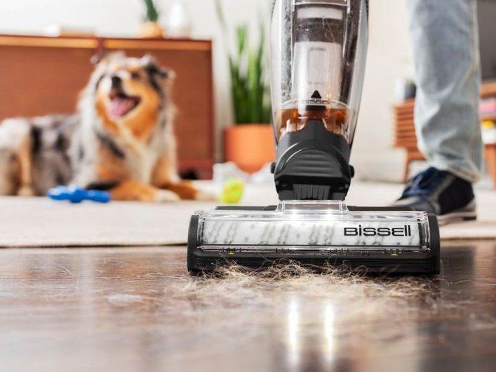 Cleaning pet hair from the floor with the Bissell CrossWave Hydrosteam wet/dry vacuum.