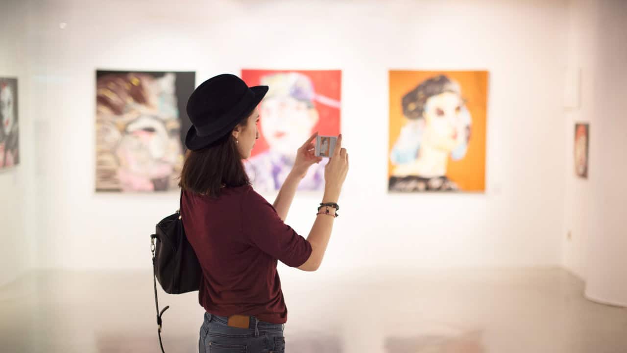 Woman Visiting Art Gallery