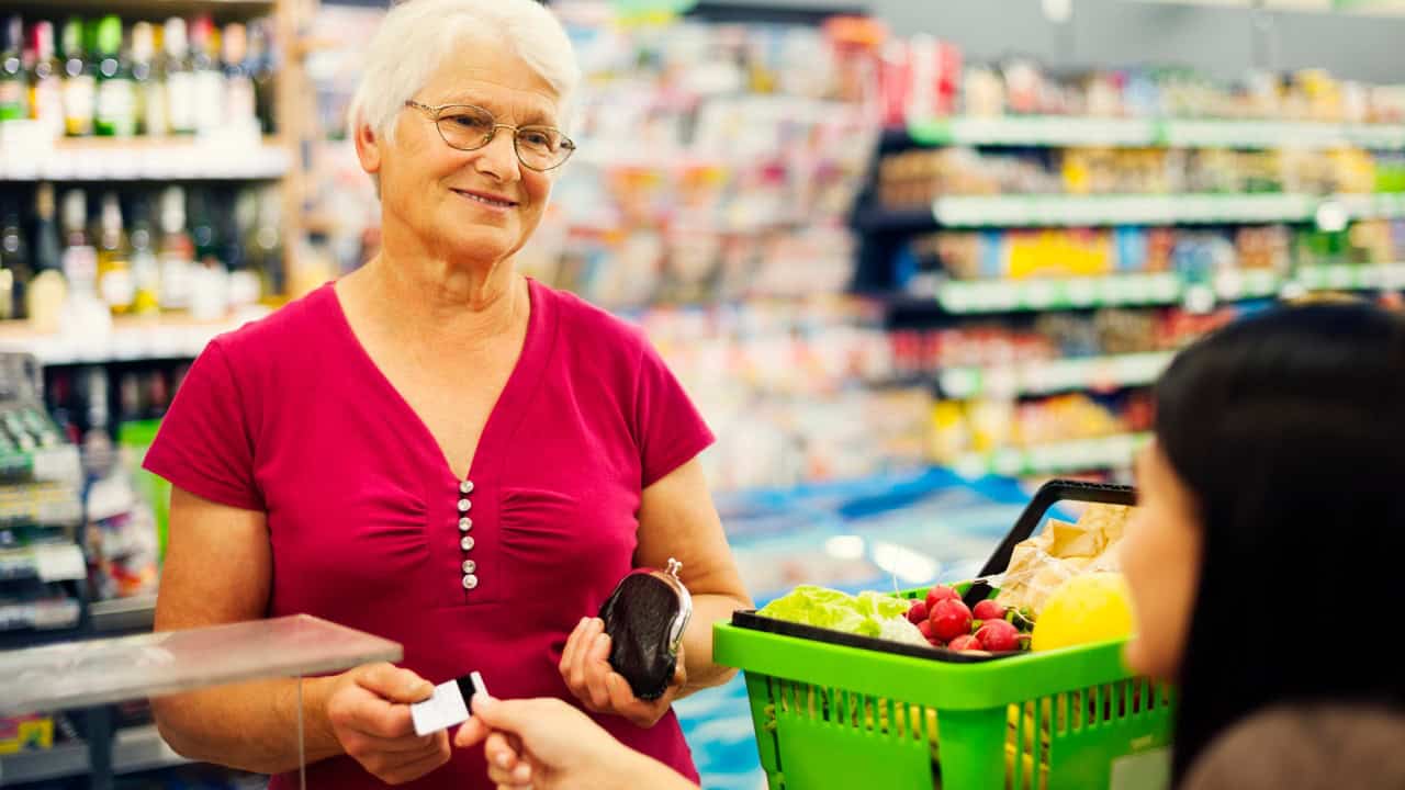 Senior woman at supermarket